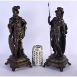 A PAIR OF LATE 18TH/19TH CENTURY EUROPEAN COUNTRY HOUSE BRONZE FIGURES of classical form. 36 cm high