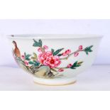 A Chinese porcelain bowl decorated with flowers and birds 7 x 15 cm.