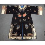 A LOVELY LATE 19TH CENTURY CHINESE BLUE SILK WORK ROBE decorated with foliage and vines. 110 cm x 13