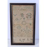 A framed Victorian sampler 36 x 18 cm.