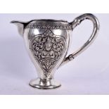 A 19TH CENTURY SOUTH EAST ASIAN CHINESE TIBETAN SILVER JUG decorated with Buddhistic figures. 153 gr