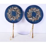 A pair of 19th Century embroidered bead work ladies fire screens with gilt wood handles 39 cm (2).