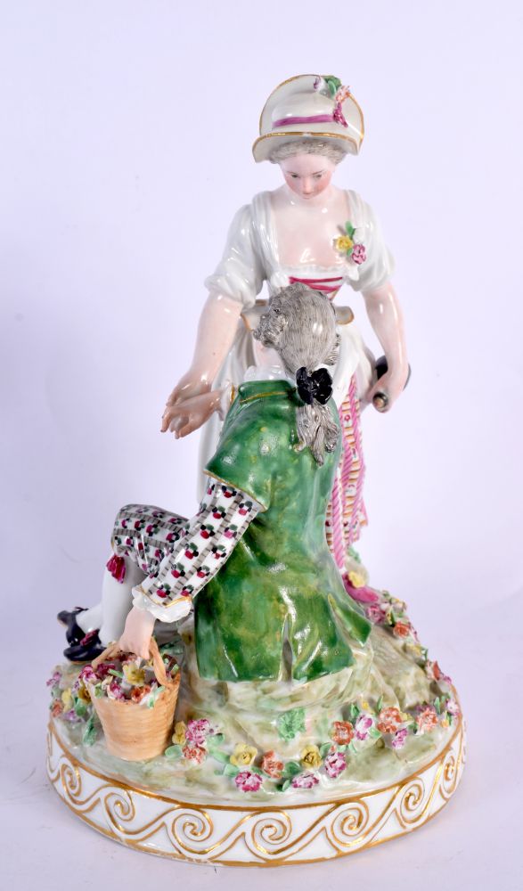 A 19TH CENTURY MEISSEN PORCELAIN FIGURAL GROUP depicting a gallant and female amongst foliage. 22 cm - Image 2 of 4
