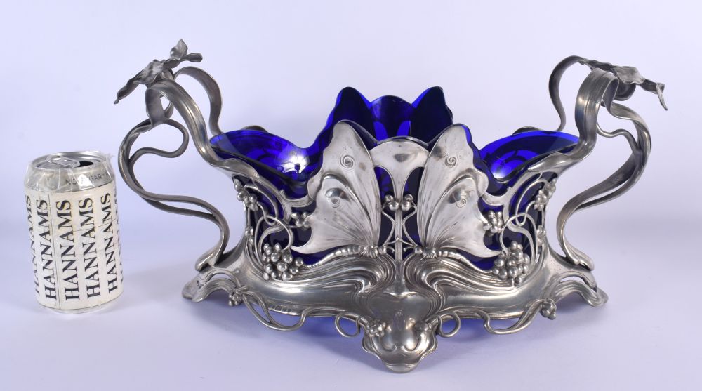 A LOVELY LARGE ART NOUVEAU WMF PEWTER AND BLUE GLASS JARDINIERE formed with opposing dragonflies and