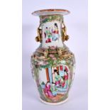 A 19TH CENTURY CHINESE CANTON FAMILLE ROSE PORCELAIN VASE Qing. 23.5 cm high.