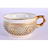 Early 20th century Sevres reticulated teacup with pierced outer wall, two Sevres marks to base. 9.5