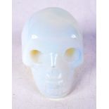 A CONTINENTAL GLASS SKULL. 5 cm x 3.75 cm.