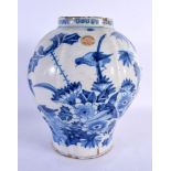 AN 18TH CENTURY DELFT BLUE AND WHITE TIN GLAZED VASE painted with birds amongst foliage. 23 cm x 17