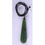 AN EARLY 20TH CENTURY NEW ZEALAND M?ORI CARVED NEPHRITE JADE PATU PENDANT. Pendant 6.25 cm long.