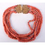 AN 18CT GOLD AND CORAL NECKLACE. 186 grams. 38 cm long.