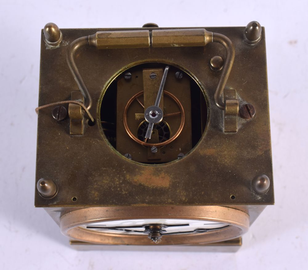 AN UNUSUAL ANTIQUE FRENCH OPEN ESCAPEMENT BRASS CLOCK. 15 cm high inc handle. - Image 5 of 6