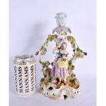 A 19TH CENTURY GERMAN MEISSEN STYLE PORCELAIN CANDLESTICK. 25 cm x 12 cm.