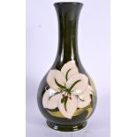 A MOORCROFT VASE. 17 cm high.