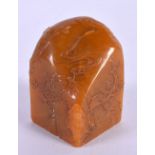 A LOVELY CHINESE CARVED ORANGE SOAPSTONE SEAL 20th Century, probably tianhuang. 5.5 cm x 3 cm.