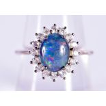 A SILVER AND OPAL RING. 2.7 grams. P.