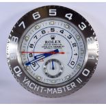 A ROLEX SHOP DISPLAY ADVERTISING WALL CLOCK. 33 cm diameter.