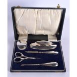 AN ART DECO SILVER MANICURE SET. Birmingham 1923. Silver 103 grams. Largest utensil 14 cm wide.