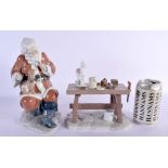 A LARGE LLADRO FIGURE OF SANTA CLAUS with matching work shop. Santa 19 cm high. (2)