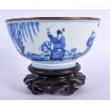 AN EARLY CHINESE QING BLUE AND WHITE PORCELAIN BOWL possibly Blue de Hue, painted with figures in la