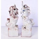 Raychen Stanislas 1897-1994 studio pottery figures of Unicorn and a lion, both decorated with coats