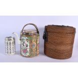 A 19TH CENTURY CHINESE CANTON FAMILLE ROSE TEAPOT AND COVER within a wicker case. 20 cm x 12 cm.