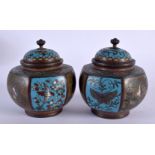 A PAIR OF 19TH CENTURY JAPANESE MEIJI PERIOD CLOISONNE ENAMEL JARS AND COVERS decorated with insects