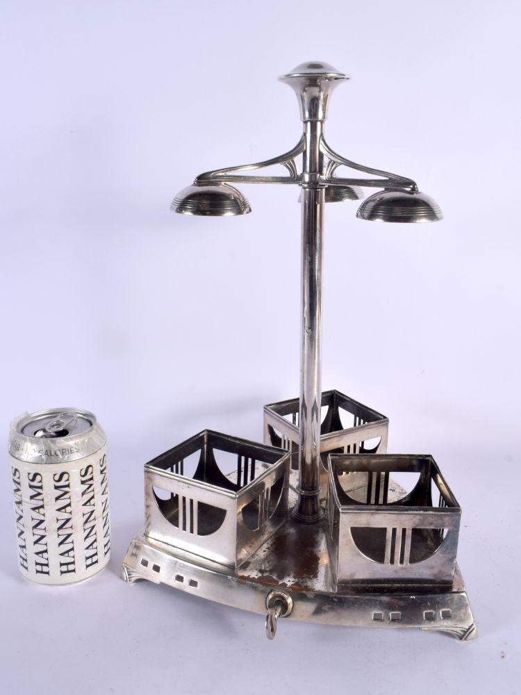 A LARGE ART DECO WMF SILVER PLATED TANTALUS of stylish form. 38 cm x 18 cm.