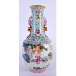 AN EARLY 20TH CENTURY CHINESE TWIN HANDLED FAMILLE ROSE PORCELAIN VASE Late Qing/Republic, bearing Q