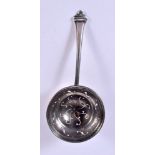 A 20TH CENTURY SILVER TEA STRAINER BY THOMAS BRADBURY & SONS. Hallmarked Sheffield 1928. 14.2cm x