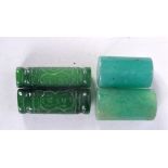 FOUR CHINESE CARVED JADE TOGGLES 20th Century. 86 grams. Largest 4.5 cm x 1.25 cm. (4)