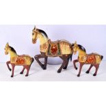 A collection of Indian painted wooden horses 32 x 27
