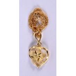 A 14CT GOLD HEART NECKLACE. 1.5 grams. 46 cm long, pendant 2.25 cm wide.