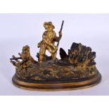 A 19TH CENTURY FRENCH BRONZE FIGURE OF A WORKING MALE modelled upon a naturalistic base. 14 cm x 11