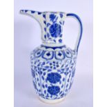 A TURKISH ISLAMIC BLUE AND WHITE WATER JUG. 27 cm high.