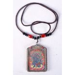 AN EARLY 20TH CENTURY CHINESE TIBETAN THANGKA NECKLACE. 47 grams. 6.75 cm x 4.5 cm.