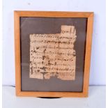 A small framed fragment of Coptic script 17 x 14 cm.