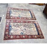 A pair of Persian Silk rugs 220 x 141 cm (2)
