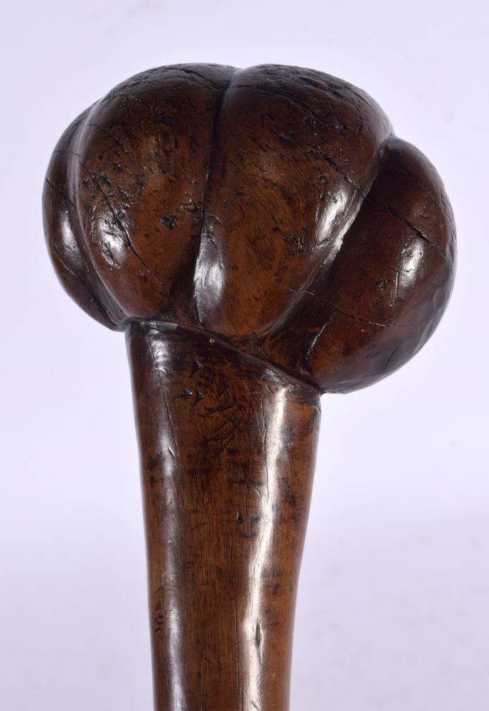 A 19TH CENTURY FIJIAN TRIBAL CARVED WOOD CLUB with gnarled terminal. 78 cm long.