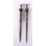 A PAIR OF 19TH CENTURY AFRICAN TRIBAL PINS. 16 cm long.