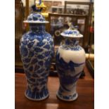 TWO 19TH CENTURY CHINESE BLUE AND WHITE PORCELAIN VASES Kangxi style. Largest 35 cm high. (2)