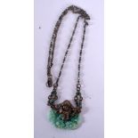 AN ART NOUVEAU FRENCH JADEITE GLASS NECKLACE overlaid with a female portrait. 54 cm long, pendant 3