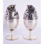 A PAIR OF SILVER CHICK EGG WARMERS. 161 grams. 11.5 cm x 5 cm.