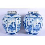A PAIR OF 18TH CENTURY DUTCH DELFT BLUE AND WHITE LOBED VASES painted with Oriental figures in lands