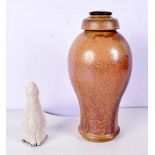 A Royal Doulton stone ware lidded vase together with a studio pottery rabbit 27 cm (2).