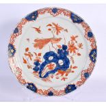 A RARE 18TH CENTURY DELFT IMARI TIN GLAZED ENAMEL PLATE painted with a bird perched amongst flowerin