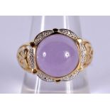 A 14CT GOLD DIAMOND AND LAVENDER JADE RING. P. 6.7 grams.
