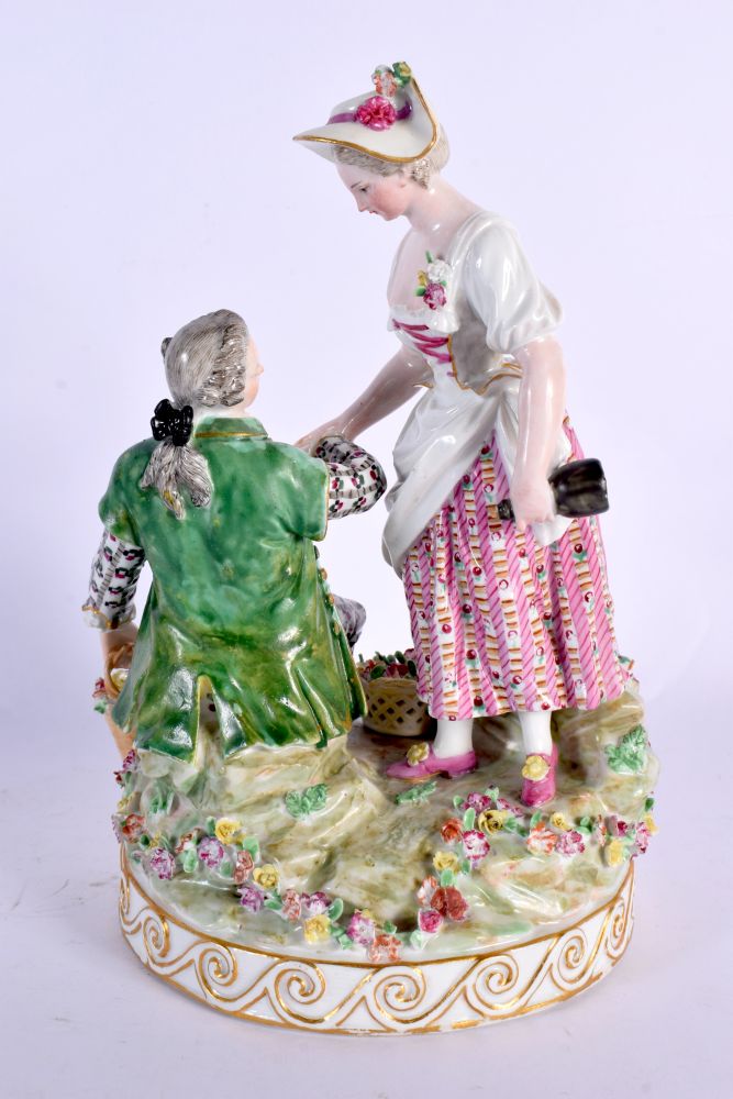 A 19TH CENTURY MEISSEN PORCELAIN FIGURAL GROUP depicting a gallant and female amongst foliage. 22 cm - Image 3 of 4