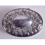 AN ANTIQUE CONTINENTAL SILVER PILL BOX decorated with repousse flowers. 78 grams. 7 cm x 5 cm.
