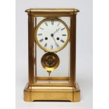 A FRENCH FOUR GLASS MANTEL CLOCK, the twin barrel movement with anchor escapement striking on a