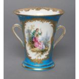 A FRENCH PORCELAIN VASE, c.1900, of flared cylindrical form with two loop handles, painted in